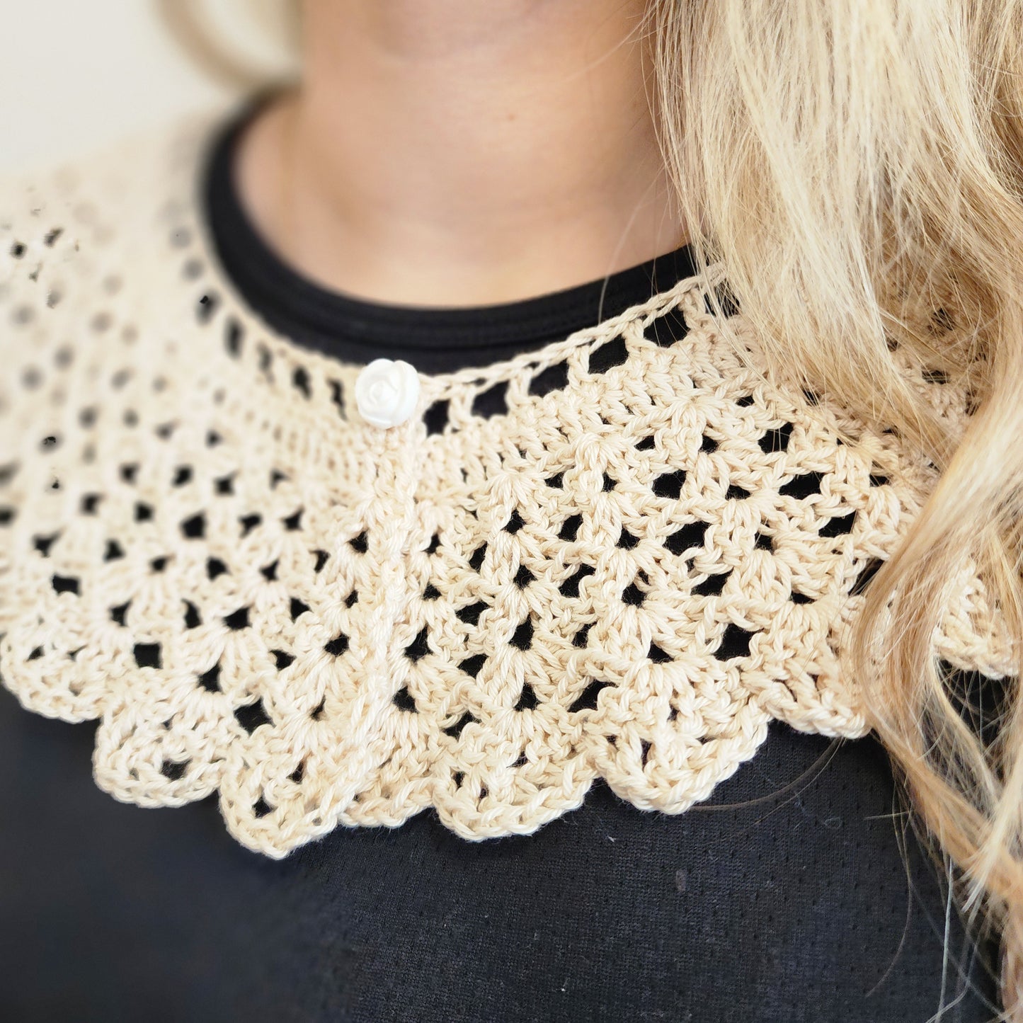 Close-up photo of a woman wearing a Victorian Whisper Crochet lace collar