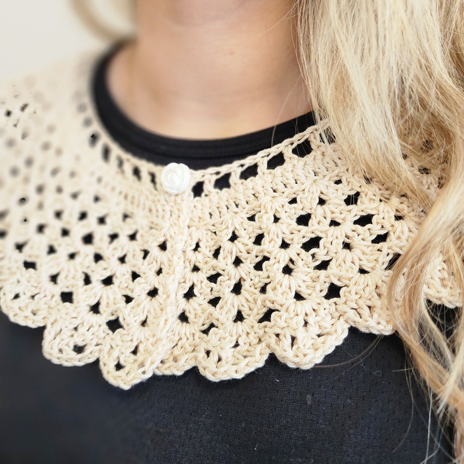 Close-up photo of a woman wearing a Victorian Whisper Crochet lace collar